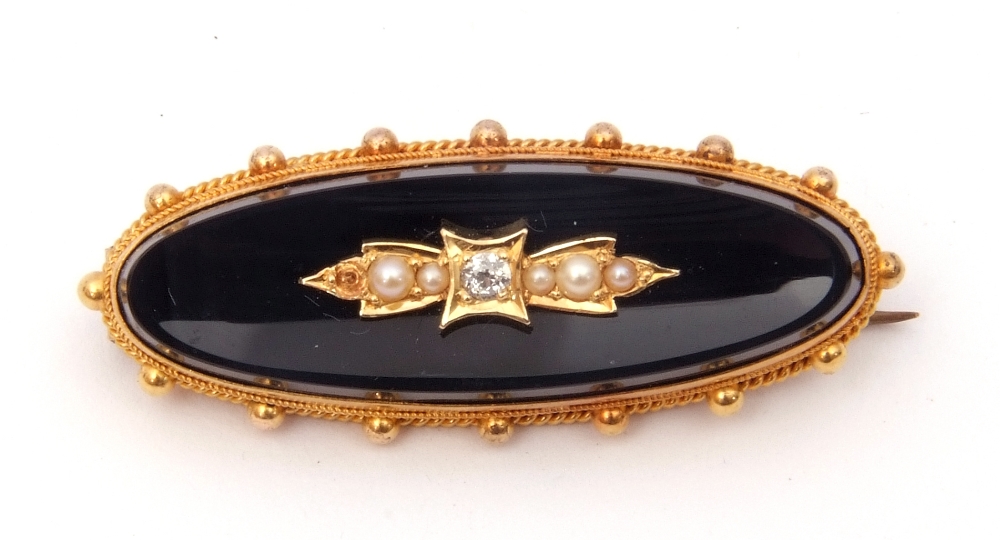 15ct stamped onyx, diamond and seed pearl mourning brooch, the elongated oval onyx panel applied - Image 3 of 3