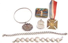 Mixed Lot: Silver Jubilee brooch, Birmingham 1911, a silver ARP badge, London 1939, a Victorian 60th