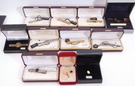 Mixed Lot: nine cased gent's tie-clips, silver, onyx examples, three chrome, four gold plated,