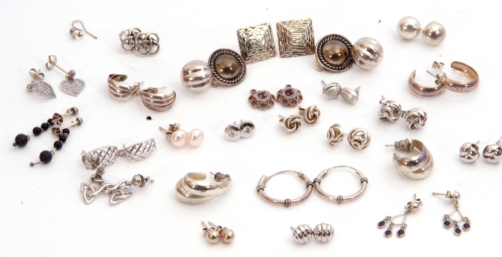 Twenty pairs of mainly white metal earrings together with six single earrings, g/w 38.8gms - Image 2 of 2