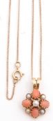 Vintage 9ct gold seed pearl and coral set cluster pendant suspended from a 375 stamped trace chain