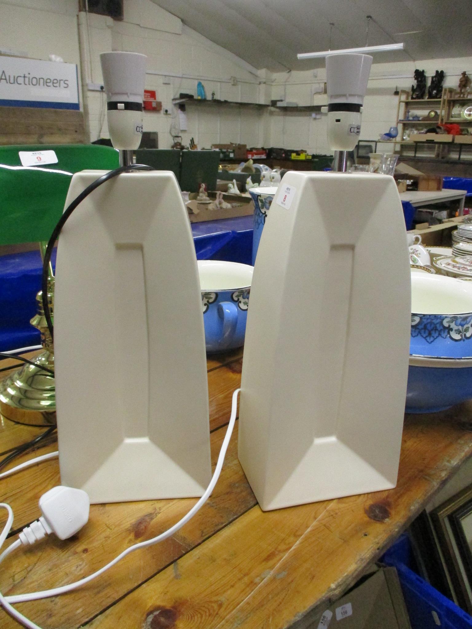 PAIR OF ANGULAR WHITE CERAMIC LAMPS