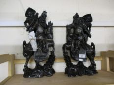 TWO ORIENTAL WOODEN SCULPTURES OF WARRIORS ON HORSEBACK