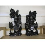 TWO ORIENTAL WOODEN SCULPTURES OF WARRIORS ON HORSEBACK