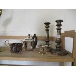 PAIR OF PLATED CANDLESTICKS AND TEA POT, MILK JUG AND SUGAR BOWL