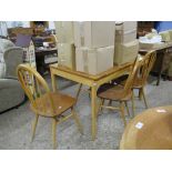 MODERN DINING SUITE COMPRISING A LIGHT WOOD TABLE AND FOUR STICK BACK CHAIRS