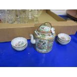 CANTONESE FAMILLE ROSE TEA POT AND COVER WITH WIRE HANDLE AND QUANTITY OF SMALL TEA BOWLS