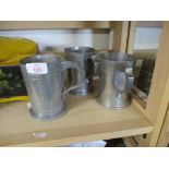 THREE HAMMERED PEWTER MUGS