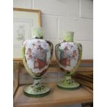 TWO CERAMIC VASES DECORATED WITH CHERUBS