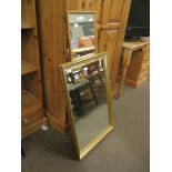 TWO MODERN GILT FRAMED WALL MIRRORS