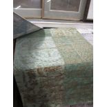 GREEN GEOMETRICALLY DESIGNED RUG