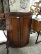 19TH CENTURY INLAID OAK BOW FRONTED CORNER CUPBOARD, 67CM WIDE