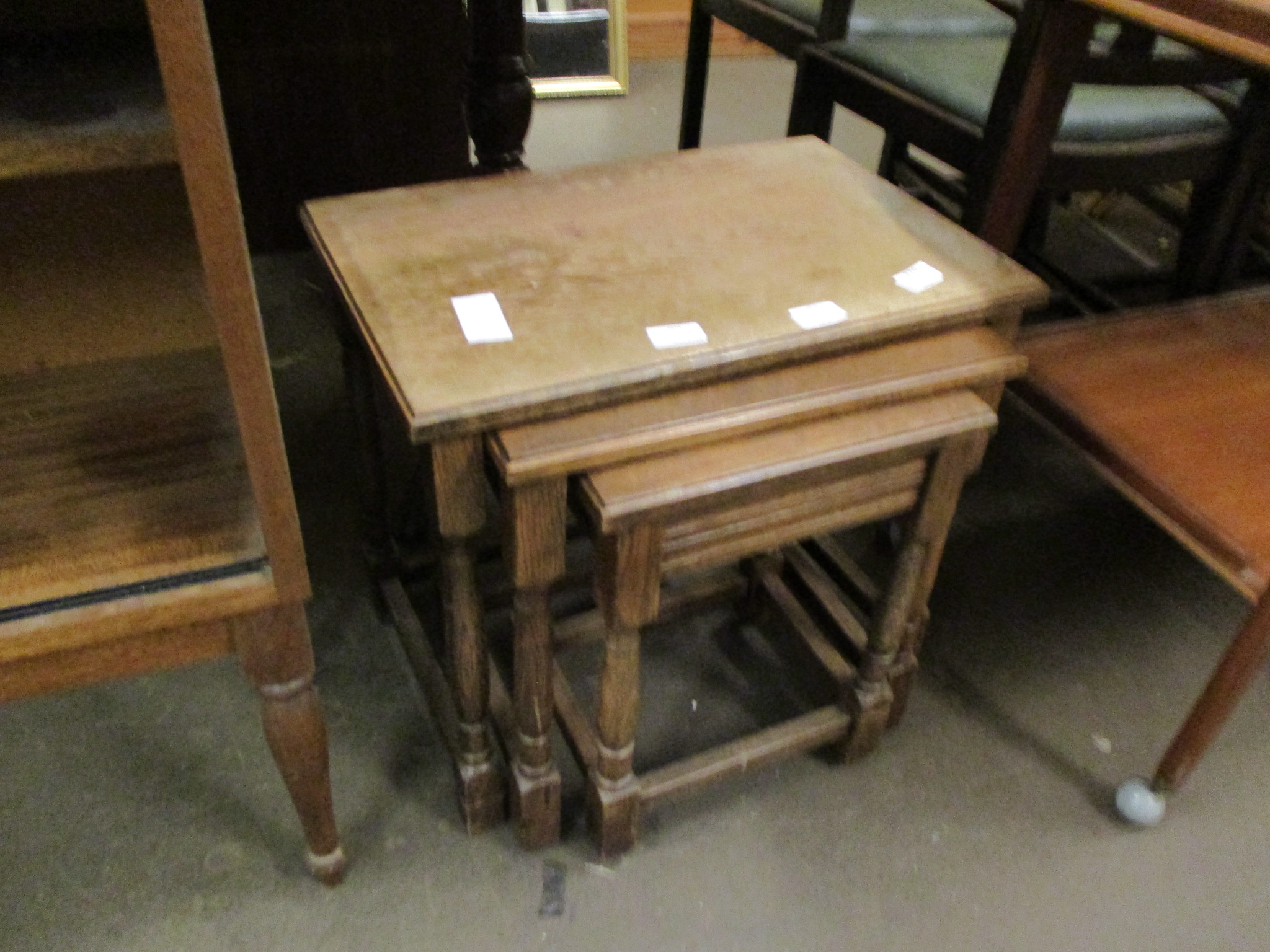 NEST OF THREE OAK TABLES, LARGEST 51CM WIDE