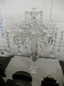 GLASS CANDELABRA WITH CENTRAL COLUMN AND FOUR SCONCES, ALL WITH GLASS DROPLETS