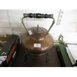 COPPER KETTLE WITH WOODEN HANDLE ON METAL STAND