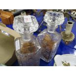 TWO CUT GLASS DECANTERS AND STOPPERS