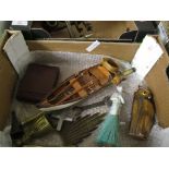 SMALL TRAY CONTAINING TREEN ITEMS INCLUDING OWL BRUSH, MODEL OF A CANOE ETC