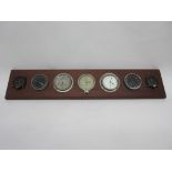 Mounted set of vintage car clocks, including Smiths, Jaeger, Elgin etc, 80cm wide