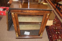 Victorian inlaid walnut pier cabinet applied with gilt metal mounts, glazed door enclosing plush