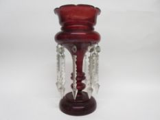 Ruby coloured glass table lustre, 33cm high