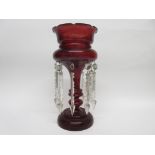 Ruby coloured glass table lustre, 33cm high