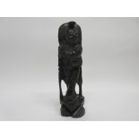 Chinese wooden model of a deity, 28cm high