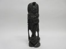 Chinese wooden model of a deity, 28cm high