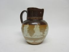 Large Doulton jug commemorating the 50th Jubilee of Queen Victoria 1837-1887, decorated in relief