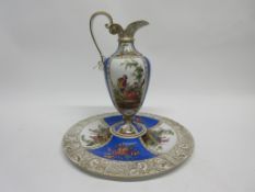 Dresden porcelain ewer on large circular stand, decorated in Meissen style with flowers and