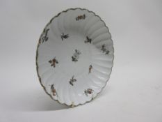 Meissen fluted dish decorated with flowers, crossed swords mark and impressed numeral to base,