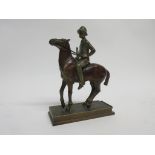 Vintage spelter figure of a mounted female polo player, 19cm high