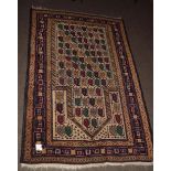 Late 20th century Caucasian rug, triple gull border, central panel of geometric designs, mainly