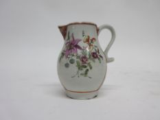 Lowestoft sparrowbeak jug in polychrome with flowers with red panels (chip to foot), 8cm high