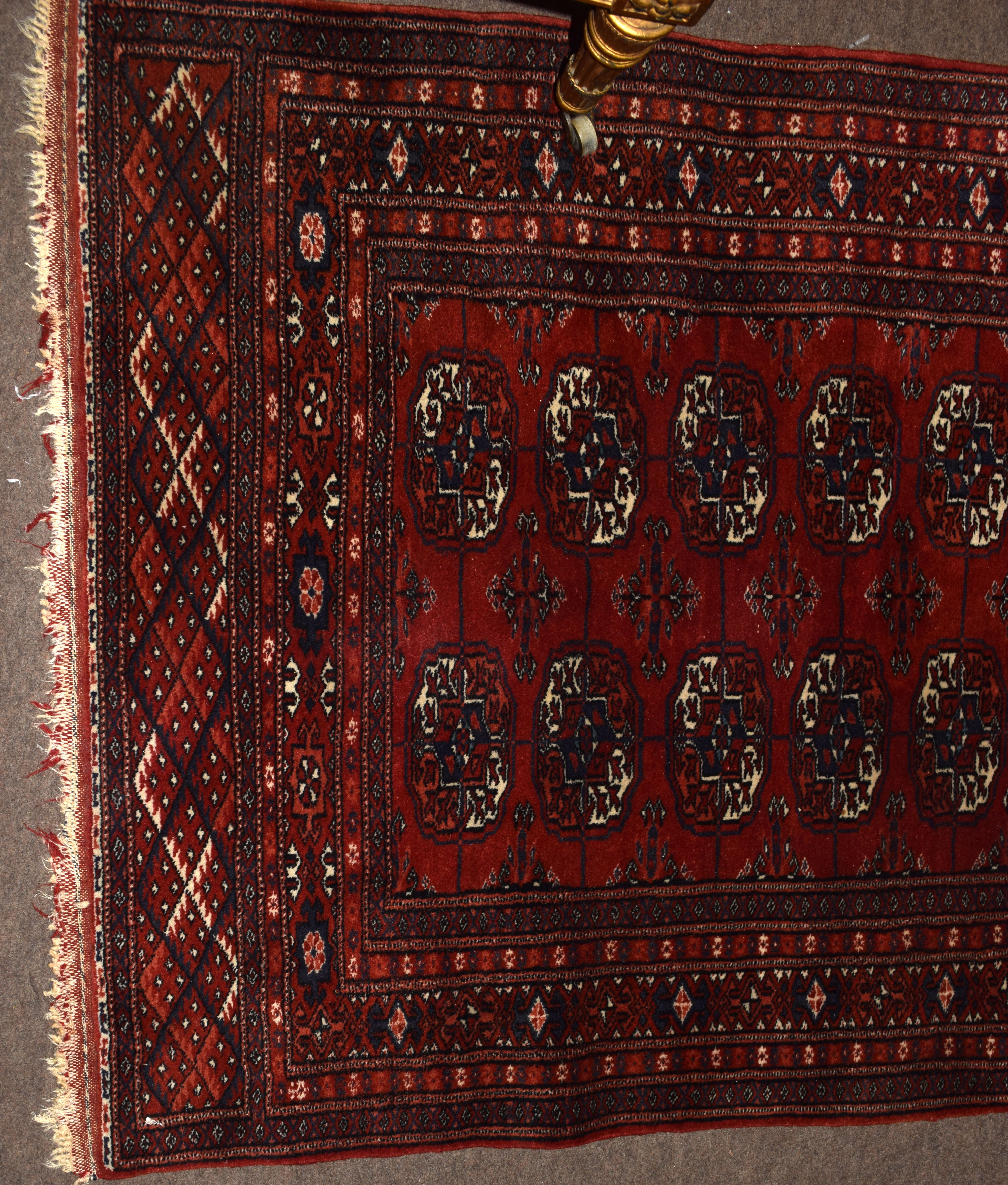 Small Shiraz rug, central lozenge panel, multi-gull border, mainly red field, 103 x 125cm