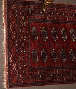 Small Shiraz rug, central lozenge panel, multi-gull border, mainly red field, 103 x 125cm