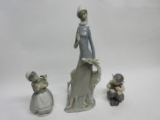 Large Lladro figure of a young girl with deer by her side, together with two further Lladro