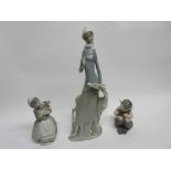 Large Lladro figure of a young girl with deer by her side, together with two further Lladro