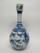 Large Chinese porcelain vase decorated with a sinuous dragon chasing the flaming pearl, the neck