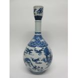 Large Chinese porcelain vase decorated with a sinuous dragon chasing the flaming pearl, the neck