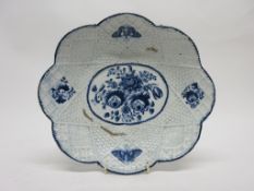 Bow porcelain dish with floral design to centre and butterfly design to border (firing flaw to