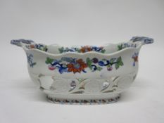 Early 19th century Japan opaque china pattern pierced bowl together with a further tureen with Imari