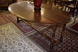 Good quality Wake style large drop leaf dining table by Simon Simpson, 205cm long