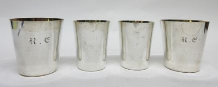 Four various silver plated tumblers