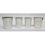 Four various silver plated tumblers