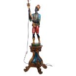 Mid-century painted plaster "blackamoor" standard lamp in the form of a figure standing and