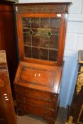 Oak bureau bookcase, leaded glazed top over fall front with drawers below, 61cm wide