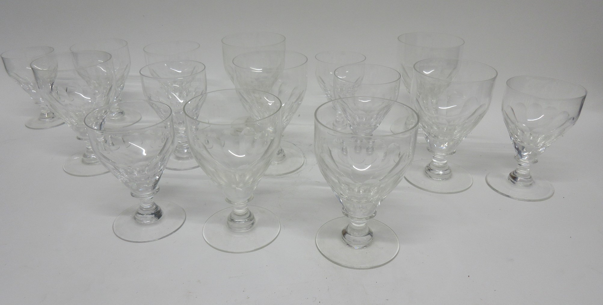 Group of seven 19th century rummers together with a number of smaller glasses in similar style, (