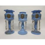 Set of three blue glass table lustres with floral and gilt decoration, tallest 31cm high (3)