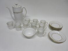 Coffee set by Spode in the Delphi pattern, comprising a coffee pot and nine cups and saucers