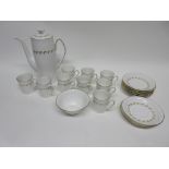 Coffee set by Spode in the Delphi pattern, comprising a coffee pot and nine cups and saucers